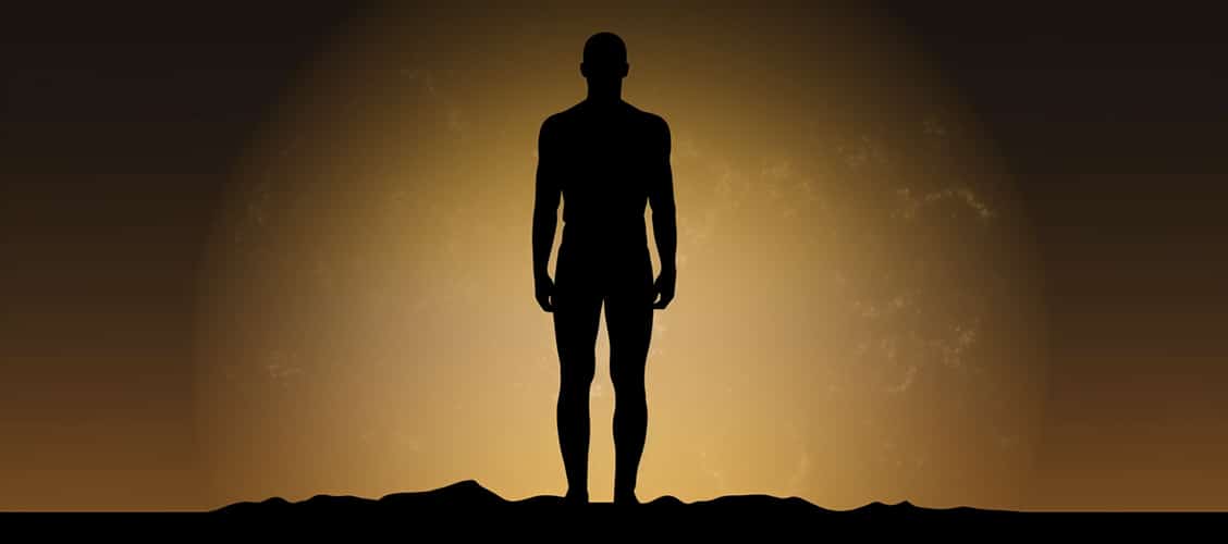 A silhouette of a person with a smaller figure